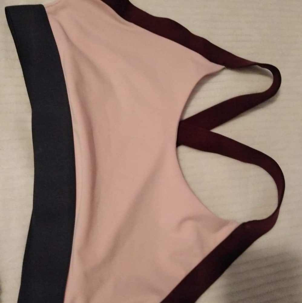 Avia pink and burgundy sport bra.